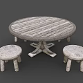 Round Wooden Table with Striped Top and Cross Base and Two Small Matching Stools