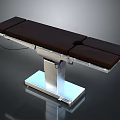 Modern Electric Surgical Table With Brown Top And Metal Base For Operating Room