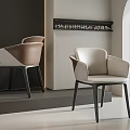 Modern Leather Dining Chairs With Beige And Brown Upholstery And Black Legs In Minimalist Interior