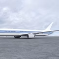 Modern White and Blue Passenger Jet Parked on Airport Tarmac With Large Wings and Engines
