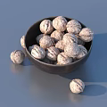 Fresh Walnuts in a Wooden Bowl with Some Scattered Outside on Gray Background