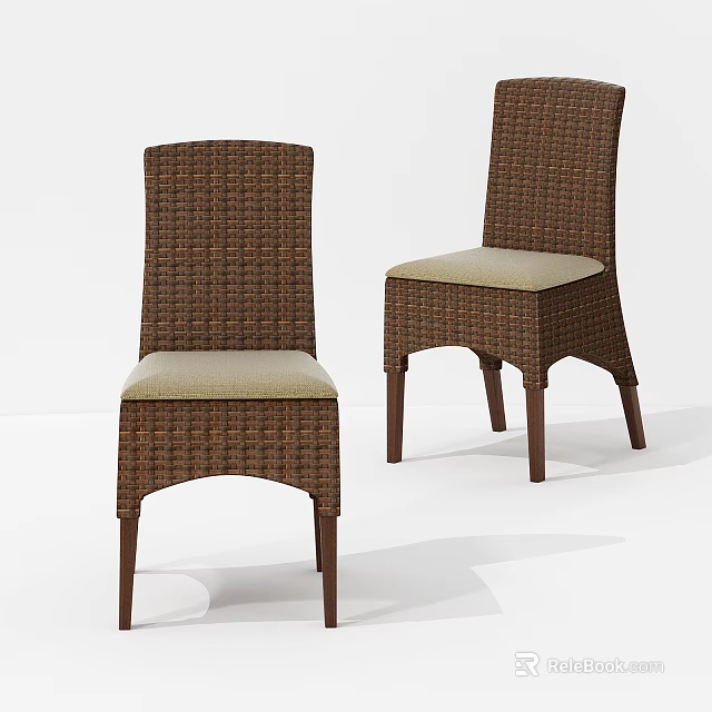 Two Modern Wicker Leisure Chairs With Light Colored Cushion And Dark Wooden Legs 3d model 