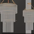 Modern Layered Ribbed Chandeliers Hanging On Gold Chains Against Dark Wall