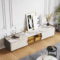Modern White and Gold TV Stand with Wall Art and Decorative Items
