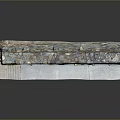 Outdoor Stone Wall Construction With Irregular Mixed Color Stones And Concrete Base