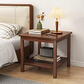 Two Tiered Walnut Nightstand with Table Lamp Vase Flowers Books and Eyeglasses in Cozy Bedroom