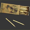 Antique Open Candle Box With Decorative Artwork Holding White Candles Inside And Beside