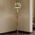 Elegant Floor Lamp With Green Fringed Lampshade Golden Pole And White Middle