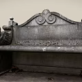 Outdoor Stone Bench with Lion Head Armrests Ornate Carvings and Classical Design