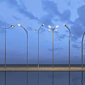 Modern Outdoor Lights with Curved Metal Poles and Water Reflection Under Cloudy Night Sky