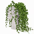 White Human Shaped Vase with White Flowers Green Hanging Vines and Small Round Leaves