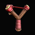 Traditional Wooden Slingshot Featuring Red Straps And Yellow Leather Wrapped Ends Design