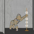 Marble Gorilla Sculpture With Gold Lamp Stand And White Spheres In Modern Interior