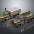 Two Military Cargo Trucks with Camouflage Paint Canvas Covered Open Beds