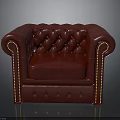 Classic Red Leather Tufted Armchair Featuring Elegant Brass Nailhead Trim Design