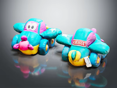 Two Turquoise Airplane Shaped Plush Dolls With Pink Nose And Yellow Base 3d model