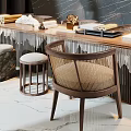 Modern Wooden Desk With Metal Frame And Woven Rattan Chairs And Decorative Items
