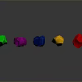 Colorful Polyhedral Gemstones in Green Pink Blue Yellow Red on Black Background with Reflections