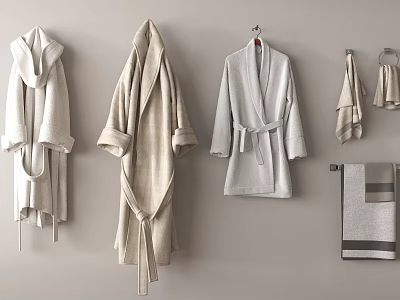 Light Toned Bathrobes And Towels Hanging On Wall 3d model