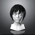 White Human Head Mannequin With Short Black Hair Displaying Clear Facial Features