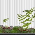 Small Garden Decorative Setup With Green Ferns Red Flowers Stones And Gray Striped Wall