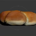 Golden Flower Shaped Raisin Bread With Shiny Crust On Black Background
