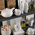 Stylish White Kitchenware Collection with Teapot Bowls Plates Olive Oil Bottle and Cookbook
