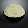 Creamy White Savory Dip Topped with Fresh Green Chives in Black Bowl