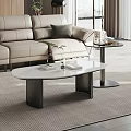 Modern Living Room Coffee Table With Marble Top And Metal Base And Decorative Books