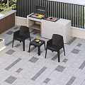 Black Outdoor Lounge Chairs With Side Table And Fruit On Patio Gray Tile Floor