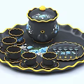 Black Tea Set Featuring Yellow Trim Blue Floral Design Teapot Cups Tray And Teaspoons