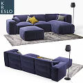 Navy Blue Two Seater Sofa with Yellow Gray Throw Pillows Ottoman and Patterned Area Rug