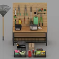 Organized Hardware Tools Display on Wooden Hanging Board with Workbench Toolboxes Cleaning Supplies and Broom