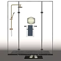 Modern Gold Shower Head In Glass Enclosure With Black Bath Mat And White Slippers