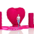 Vibrant Pink Crush Display With Heart Shape I U Plush Decorations And Person