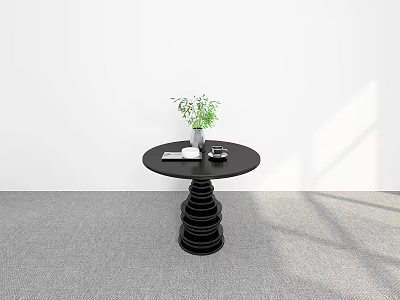 Modern Black Round Dining Table With Spiral Base Green Plant White Cup And Black Decor 3d model