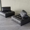 Black Leather Single Sofa With Button Tufted Design And Removable Cushions In Modern Interior 3d model