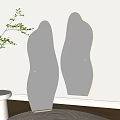 Irregular Shaped Decorative Mirrors With Vertical Lines On Light Wall Reflecting Chair And Lamp