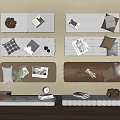 Neutral Colored Soft Pads Featuring Pillows Magazines And Green Plants