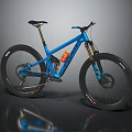 Blue Mountain Bike With Black Tires Suspension Frame Orange Water Bottle Cage
