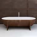Two Modern Pedestal Washbasins With Brown Bases White Basins And White Faucets