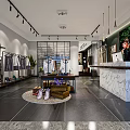 Elegant Clothing Store Interior With Clothing Racks Displayed Clothes And Marble Counter