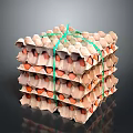 Stacked Paper Egg Cartons Tied With Green String Containing Brown Eggs