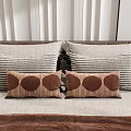 Modern Decorative Pillows With Striped And Circular Patterns In Brown Beige On Bed 3d model