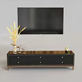 Modern Black TV Stand With Drawers Gold Knobs TV And Decorative Plants Figurine