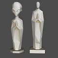 Abstract Humanoid Landscape Sculptures With Geometric Design And Praying Hands