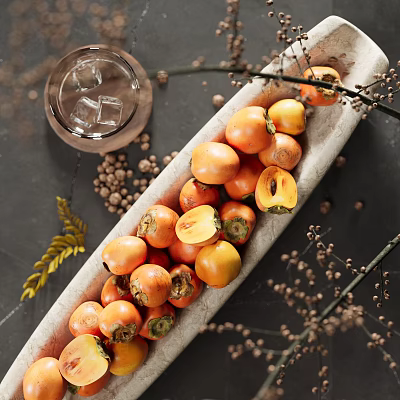 Ceramic Vessel Filled With Fresh Persimmons Surrounded By Dried Flowers And Glass With Ice 3d model