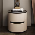 Modern Beige Nightstand With Black Top Drawers Stacked Books And Decorative Ornament
