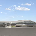 Modern Streamlined Terminal Building Design With Green Landscaping And Roadway Surroundings