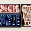 Jewelry Storage Boxes With Organized Compartments Containing Necklaces Earrings Rings And Bracelets